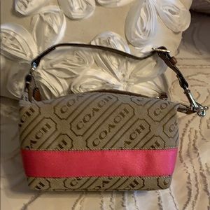 Small coach bag never used